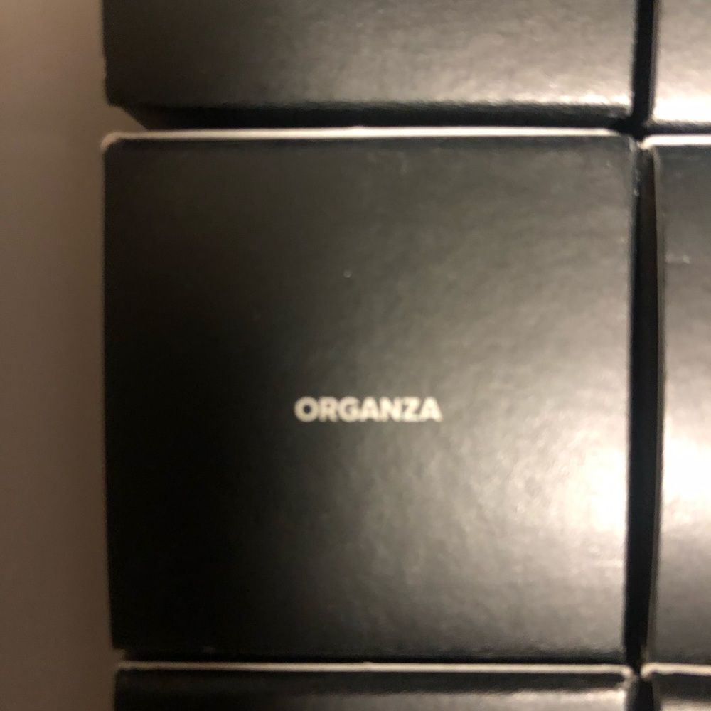 Younique spray foundation in organza